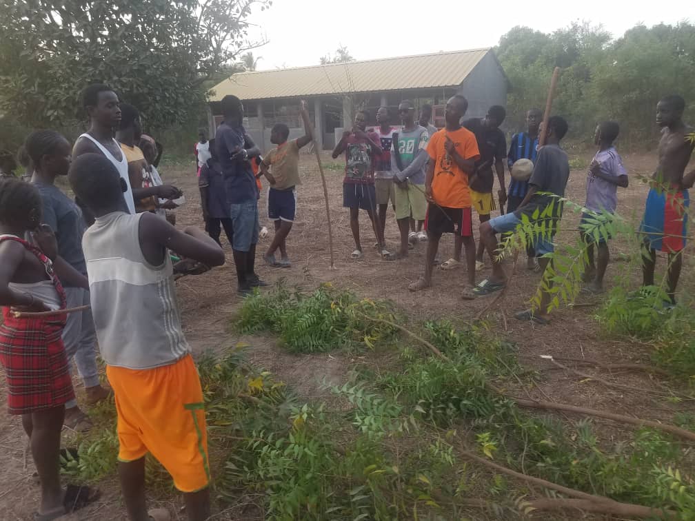 Clearing the land around the chicken house